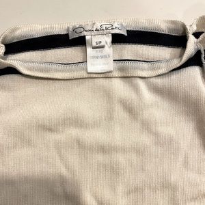 Oscar De la Renta,long sleeves cute sweater. In a good condition